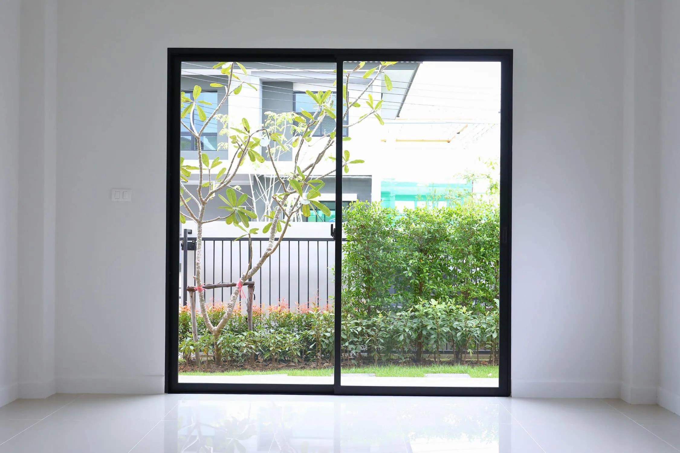 sliding door vs double door - black vinyl sliding doors
