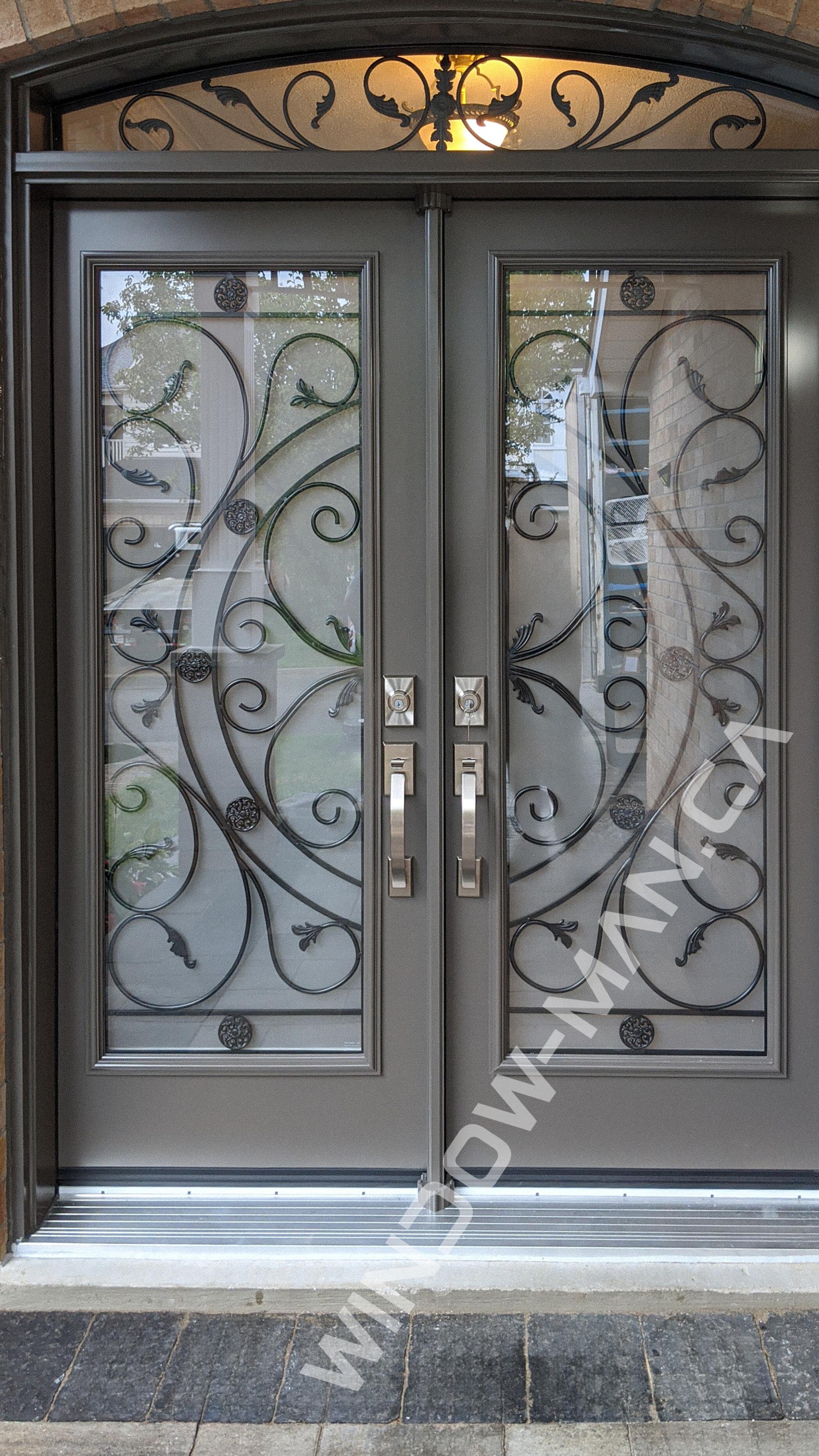 exterior grey doors double in windswept smoke with campbellsford full wrought iron glass with extended arch transom