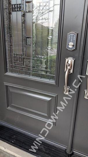 black doors exterior double with winchester 3/4 stained glass executive panels - detailed close up