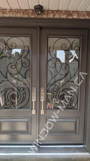 grey doors double in windswept smoke with port union 3/4 wrought iron glass executive panels - detailed close up